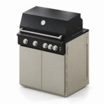 IGNES Status MID cabinet with grill, Taupe cabinet, Noir Avenue worktop, black cabinet handles, angled view. Stainless BBQ fittings and white thermometer.